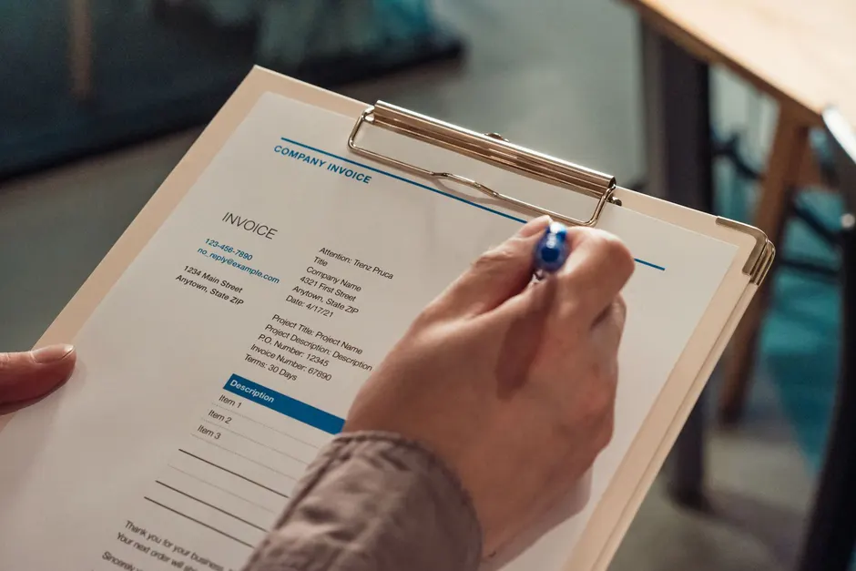 A written AC repair estimate on a clipboard
